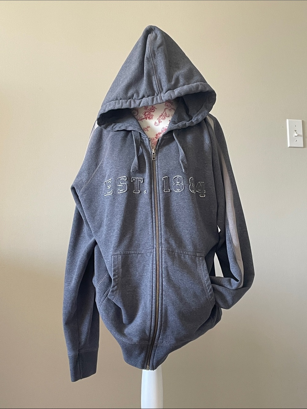 Woman’s Gray Zip-Up Hoodie Jacket with Hood and Bold Stripes on Sleeve